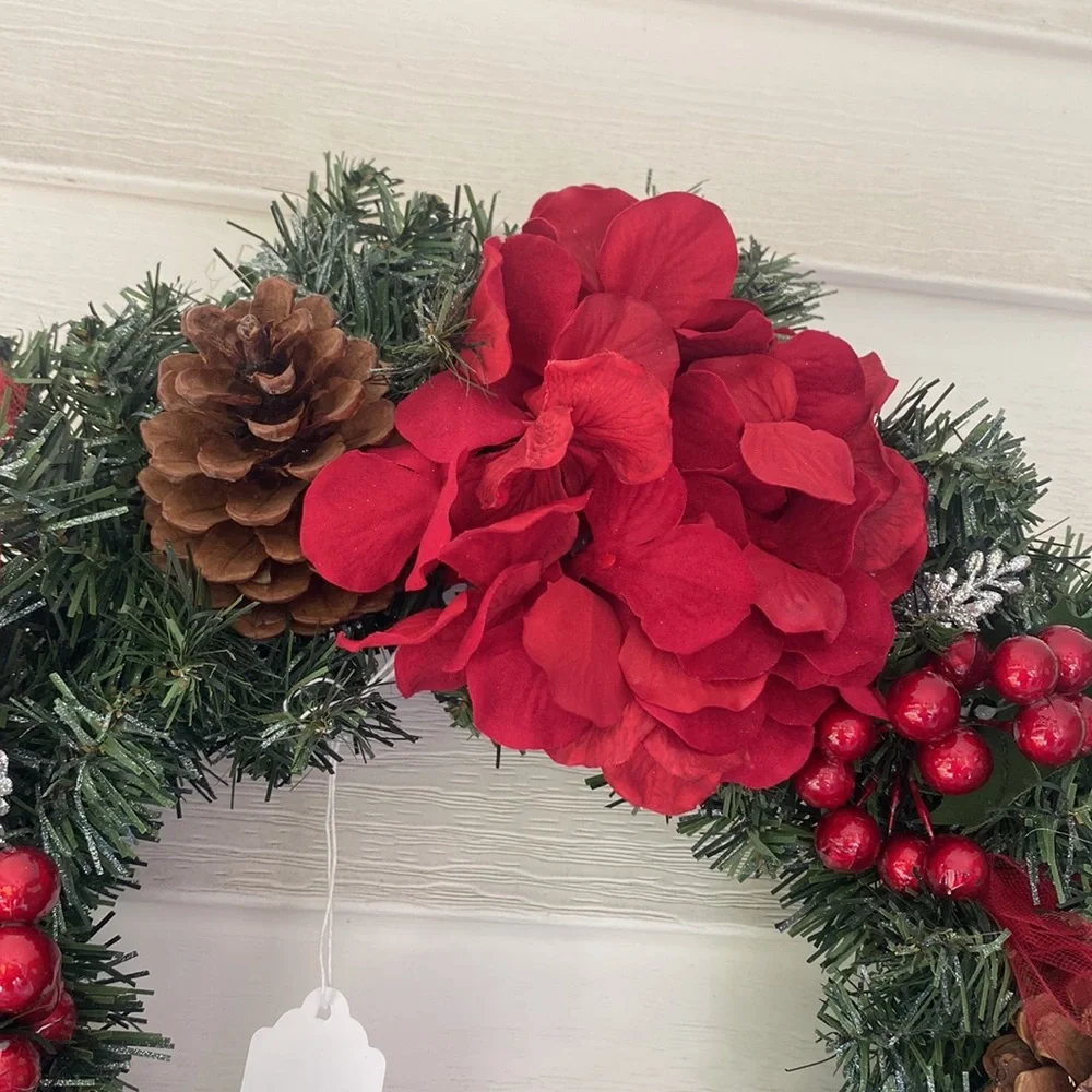 Evergreen Faux Wreath Trimmed with red accents and pine ones